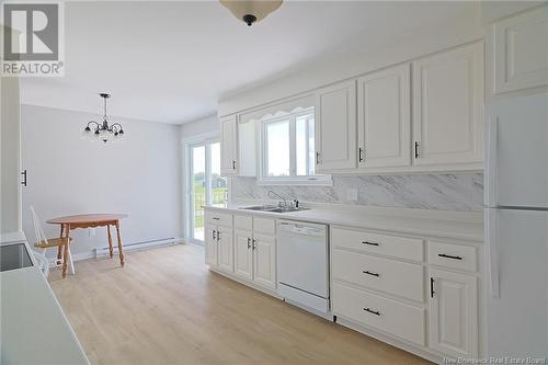 298 Route 105, Maugerville, NB - Indoor Photo Showing Kitchen With Double Sink