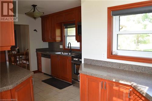 77 Rockview Road, Callander, ON - Indoor Photo Showing Kitchen With Double Sink