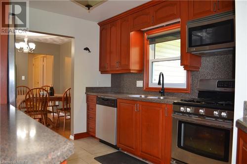 77 Rockview Road, Callander, ON - Indoor Photo Showing Kitchen With Double Sink