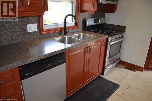 77 Rockview Road, Callander, ON - Indoor Photo Showing Kitchen With Double Sink