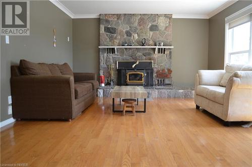 77 Rockview Road, Callander, ON - Indoor Photo Showing Living Room With Fireplace