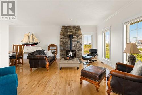 54 P'Tit Barachois, Grand-Barachois, NB - Indoor Photo Showing Living Room With Fireplace