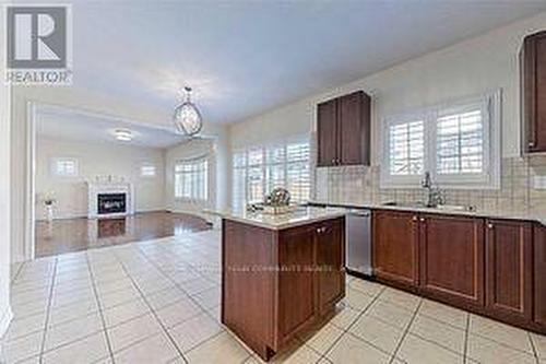 80 Serano Crescent, Richmond Hill, ON - Indoor Photo Showing Kitchen With Fireplace