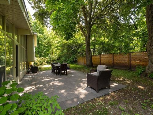 Backyard - 724 Rue Surrey, Baie-D'Urfé, QC - Outdoor With Deck Patio Veranda