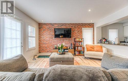 1000 Asleton Boulevard Unit# 73, Milton, ON - Indoor Photo Showing Living Room With Fireplace