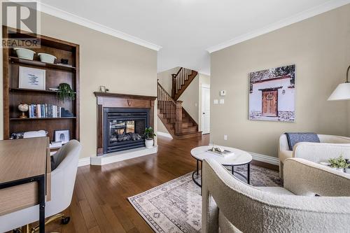 24 Atlantica Drive, Paradise, NL - Indoor Photo Showing Living Room With Fireplace