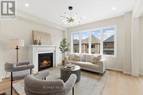 23 Ed Ewert Avenue, Clarington, ON - Indoor Photo Showing Living Room With Fireplace