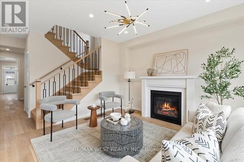 23 Ed Ewert Avenue, Clarington, ON - Indoor Photo Showing Living Room With Fireplace