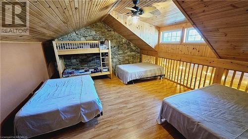 loft bedroom - 130 South Shore Road, Northern Bruce Peninsula, ON - Indoor Photo Showing Bedroom
