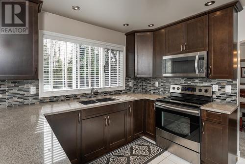 4086 Barnes Drive, Prince George, BC - Indoor Photo Showing Kitchen With Double Sink