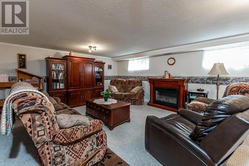 4086 Barnes Drive, Prince George, BC - Indoor Photo Showing Living Room With Fireplace