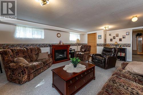 4086 Barnes Drive, Prince George, BC - Indoor Photo Showing Living Room With Fireplace