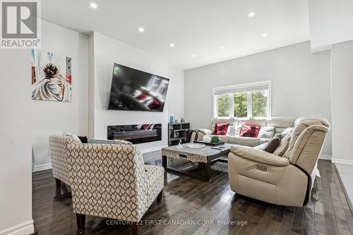 1427 Kains Woods Terrace, London, ON - Indoor Photo Showing Living Room With Fireplace