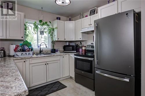 108-114 Bridge Street, Chelmsford, ON - Indoor Photo Showing Kitchen With Double Sink