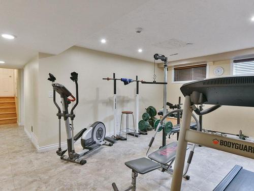 Salle d'exercice - 32 Rue Roy, Saint-Roch-De-L'Achigan, QC - Indoor Photo Showing Gym Room