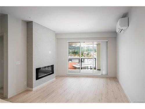 508-947 Whirlaway Cres, Langford, BC - Indoor Photo Showing Living Room With Fireplace