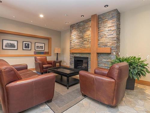 308-1375 Bear Mountain Pkwy, Langford, BC - Indoor Photo Showing Living Room With Fireplace