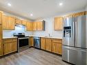 205-3108 Barons Rd, Nanaimo, BC  - Indoor Photo Showing Kitchen With Stainless Steel Kitchen 