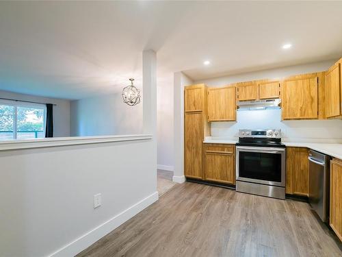 205-3108 Barons Rd, Nanaimo, BC - Indoor Photo Showing Kitchen With Stainless Steel Kitchen