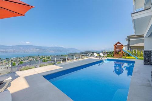 5590 Trestle Ridge Court, Kelowna, BC - Outdoor With In Ground Pool