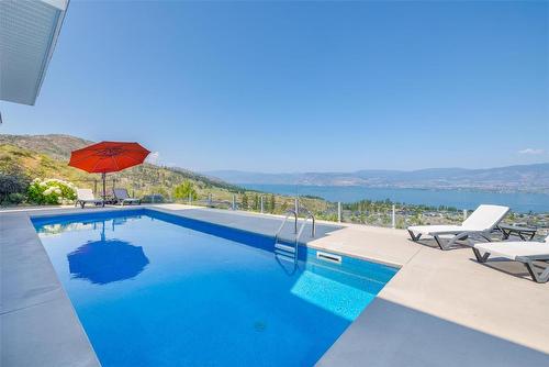 5590 Trestle Ridge Court, Kelowna, BC - Outdoor With In Ground Pool With View