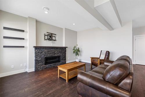 5590 Trestle Ridge Court, Kelowna, BC - Indoor Photo Showing Living Room With Fireplace