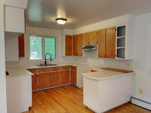 Kitchen - 107 Boul. Gérard-D.-Levesque, New Carlisle, QC - Indoor Photo Showing Kitchen With Double Sink