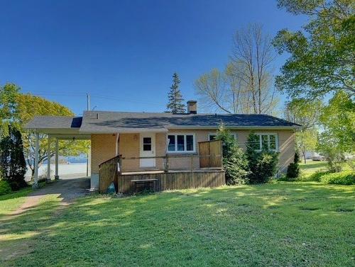 Back facade - 107 Boul. Gérard-D.-Levesque, New Carlisle, QC - Outdoor With Deck Patio Veranda