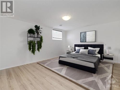 Large basement bedroom (virtually staged) - 40 Tom Gavinski Street, Arnprior, ON - Indoor Photo Showing Bedroom