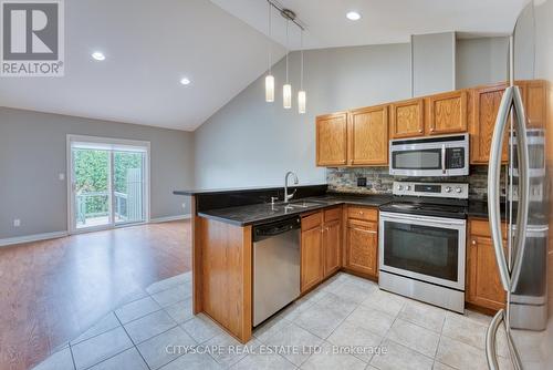 11816 Boulder Crescent, Windsor, ON - Indoor Photo Showing Kitchen With Double Sink