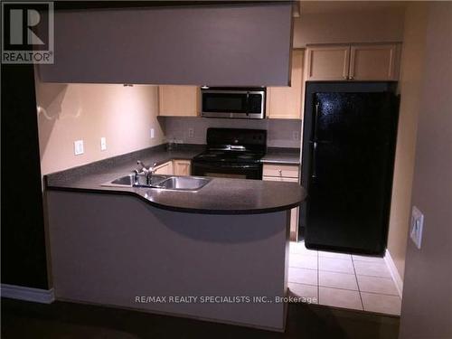 502 - 4080 Living Arts Drive, Mississauga, ON - Indoor Photo Showing Kitchen With Double Sink