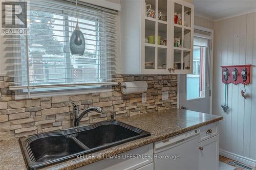 239 Southwind Court, Lambton Shores (Grand Bend), ON - Indoor Photo Showing Kitchen With Double Sink