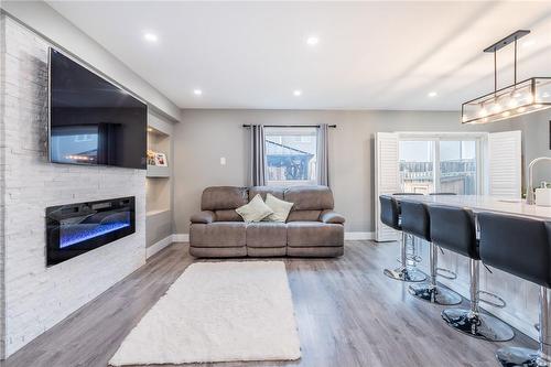 56 Whitwell Way, Binbrook, ON - Indoor Photo Showing Living Room With Fireplace