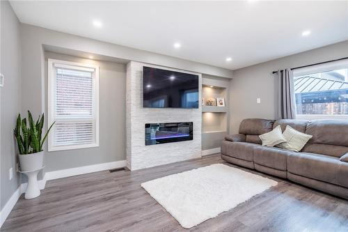 56 Whitwell Way, Binbrook, ON - Indoor Photo Showing Living Room With Fireplace