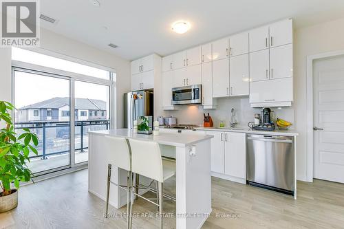 216 - 460 Gordon Krantz Avenue, Milton (Walker), ON - Indoor Photo Showing Kitchen With Upgraded Kitchen