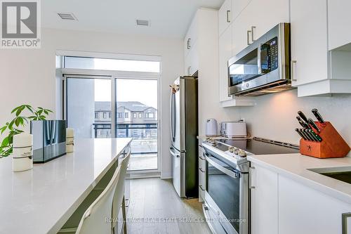 216 - 460 Gordon Krantz Avenue, Milton (Walker), ON - Indoor Photo Showing Kitchen With Upgraded Kitchen