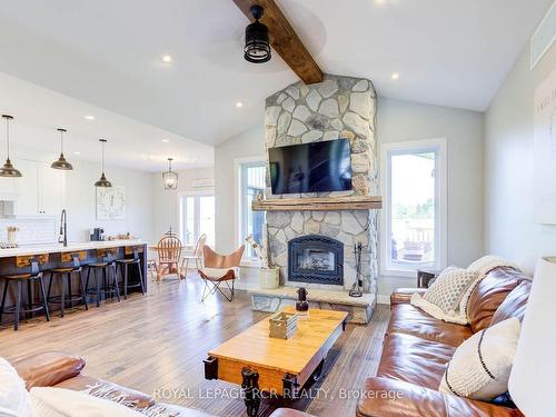 133 Parker Dr, Wellington North, ON - Indoor Photo Showing Living Room With Fireplace