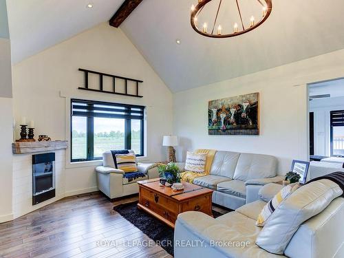 133 Parker Dr, Wellington North, ON - Indoor Photo Showing Living Room With Fireplace