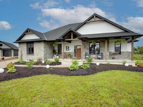 133 Parker Dr, Wellington North, ON - Outdoor With Deck Patio Veranda With Facade