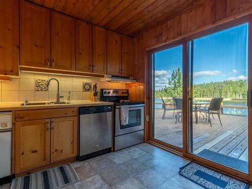 S328 Poplar Bay, S Of Keewatin, ON - Indoor Photo Showing Kitchen With Double Sink