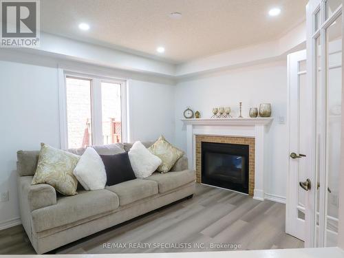 10 Banington Crescent, Brampton, ON - Indoor Photo Showing Living Room With Fireplace