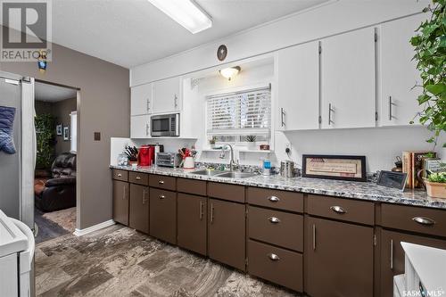 502 12Th Street Nw, Prince Albert, SK - Indoor Photo Showing Kitchen With Double Sink