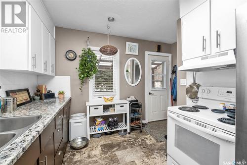 502 12Th Street Nw, Prince Albert, SK - Indoor Photo Showing Kitchen With Double Sink
