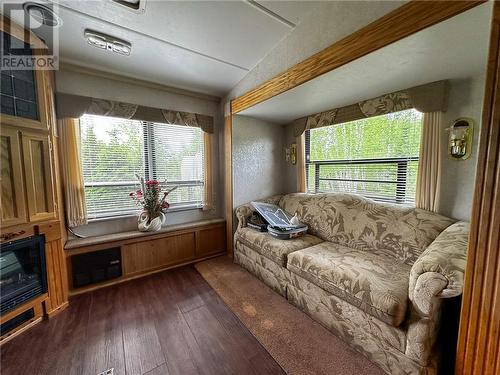 191 Ashburton Road, Field, ON - Indoor Photo Showing Living Room With Fireplace