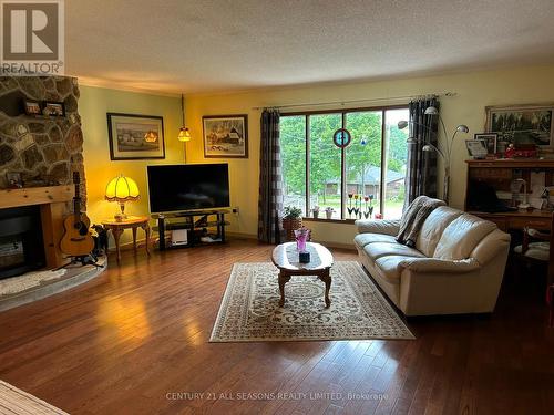 78 Maple Street, Bancroft, ON - Indoor Photo Showing Living Room With Fireplace