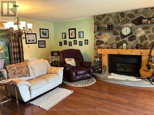 78 Maple Street, Bancroft, ON - Indoor Photo Showing Living Room With Fireplace