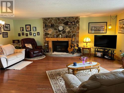 78 Maple Street, Bancroft, ON - Indoor Photo Showing Living Room With Fireplace