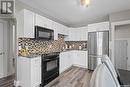536 13Th Street E, Prince Albert, SK  - Indoor Photo Showing Kitchen With Stainless Steel Kitchen With Upgraded Kitchen 