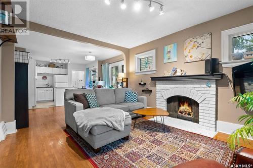 231 7Th Street E, Saskatoon, SK - Indoor Photo Showing Living Room With Fireplace