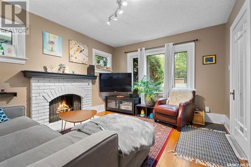 231 7Th Street E, Saskatoon, SK - Indoor Photo Showing Living Room With Fireplace